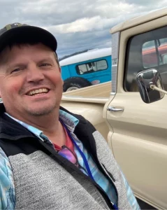 Smiling Leader of a Youth Ranch Staff